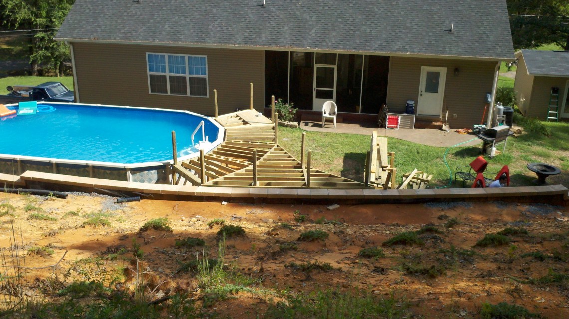 framing the deck around the swimming pool