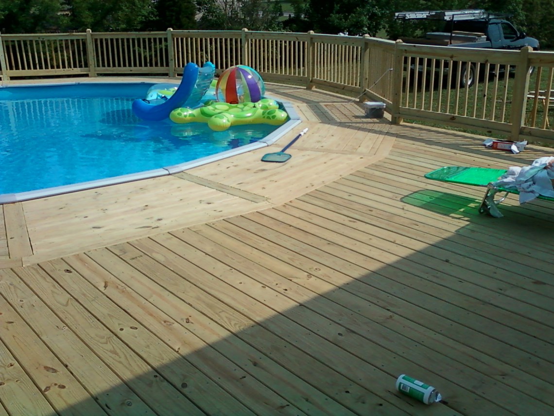 Deck around a swimming pool in Kodak, TN built by The Deck Builder.