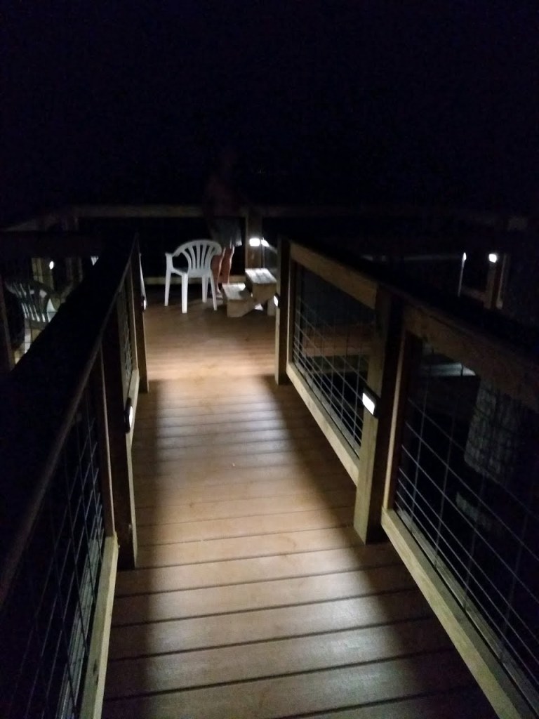 The deck at night with the deck lights on