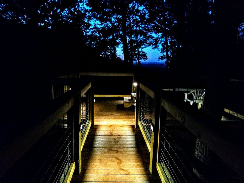 The deck at early dawn with the lights on