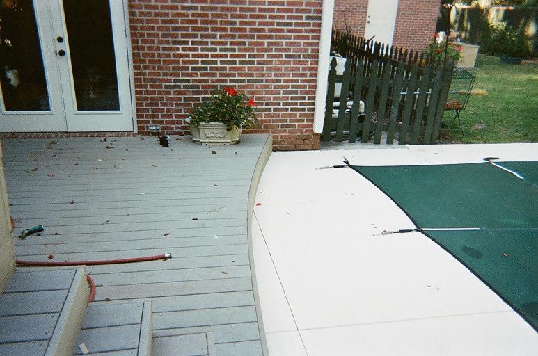 The deck has a curved step